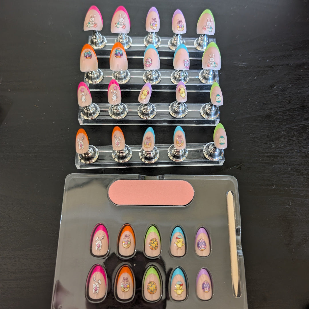 image of 20 almond gel press on nails with varying coloured tips and easter details, with a box of 10 nails below it.