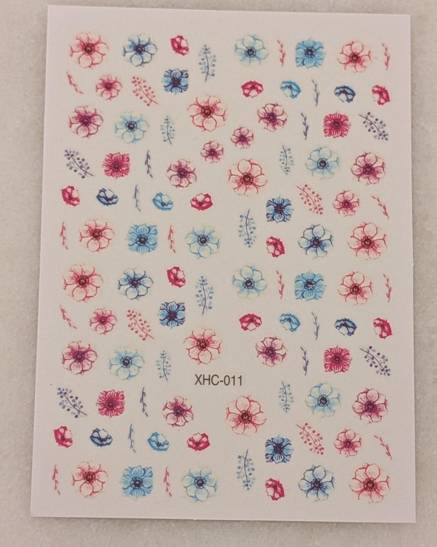 blue, red and green flowers with matching variations of leaves