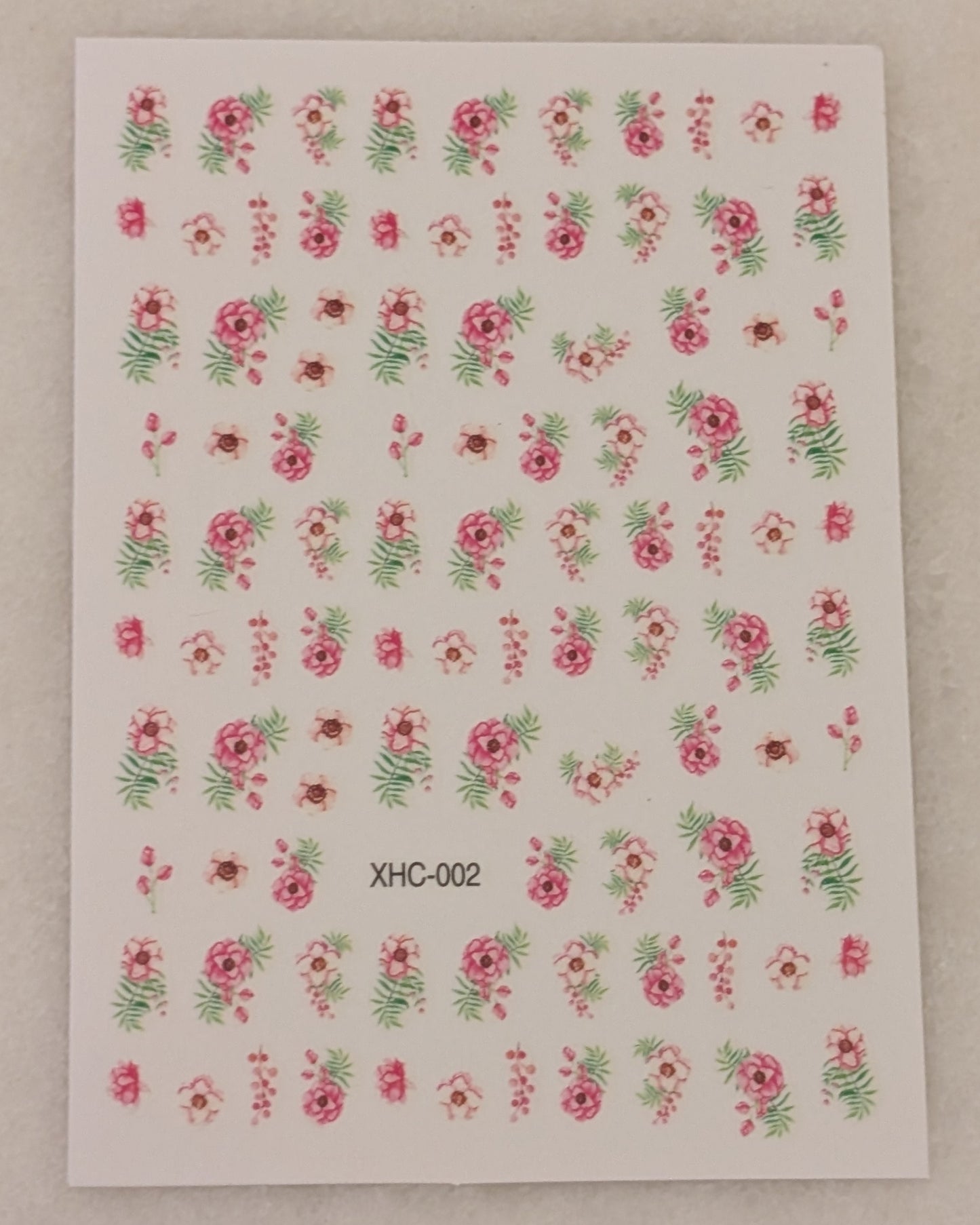 Pink and white flowers with green leaves