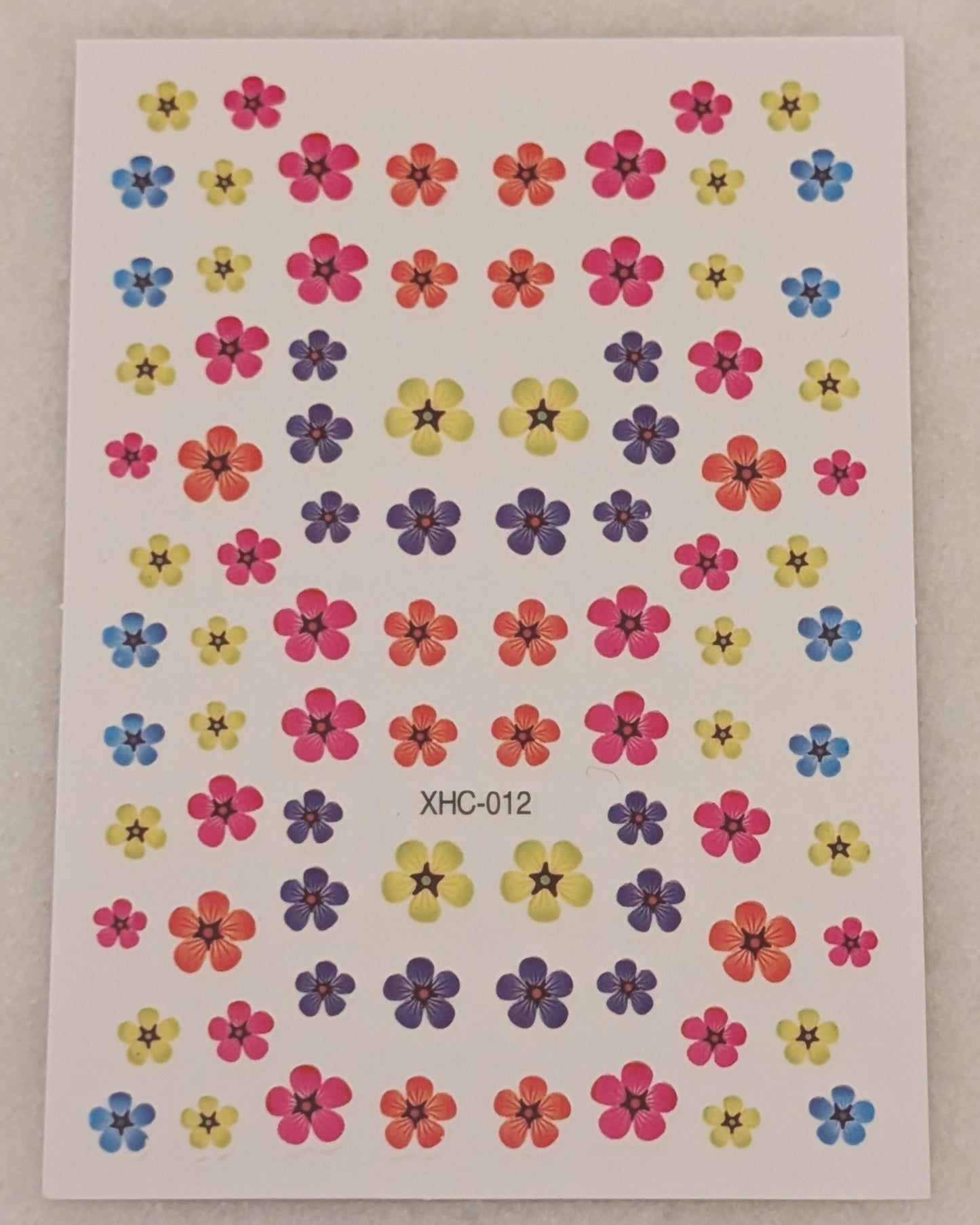 pink, blue, orange, yellow and purple flowers