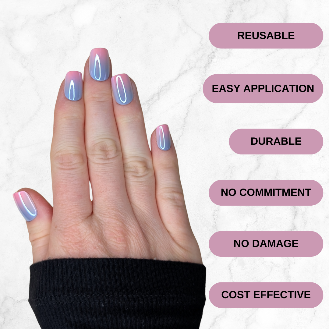 Right hand showing square nails in a metallic ombre of blue and pink against a marble background. Reusable, easy application, durable, no commitment, no damage, cost effective.