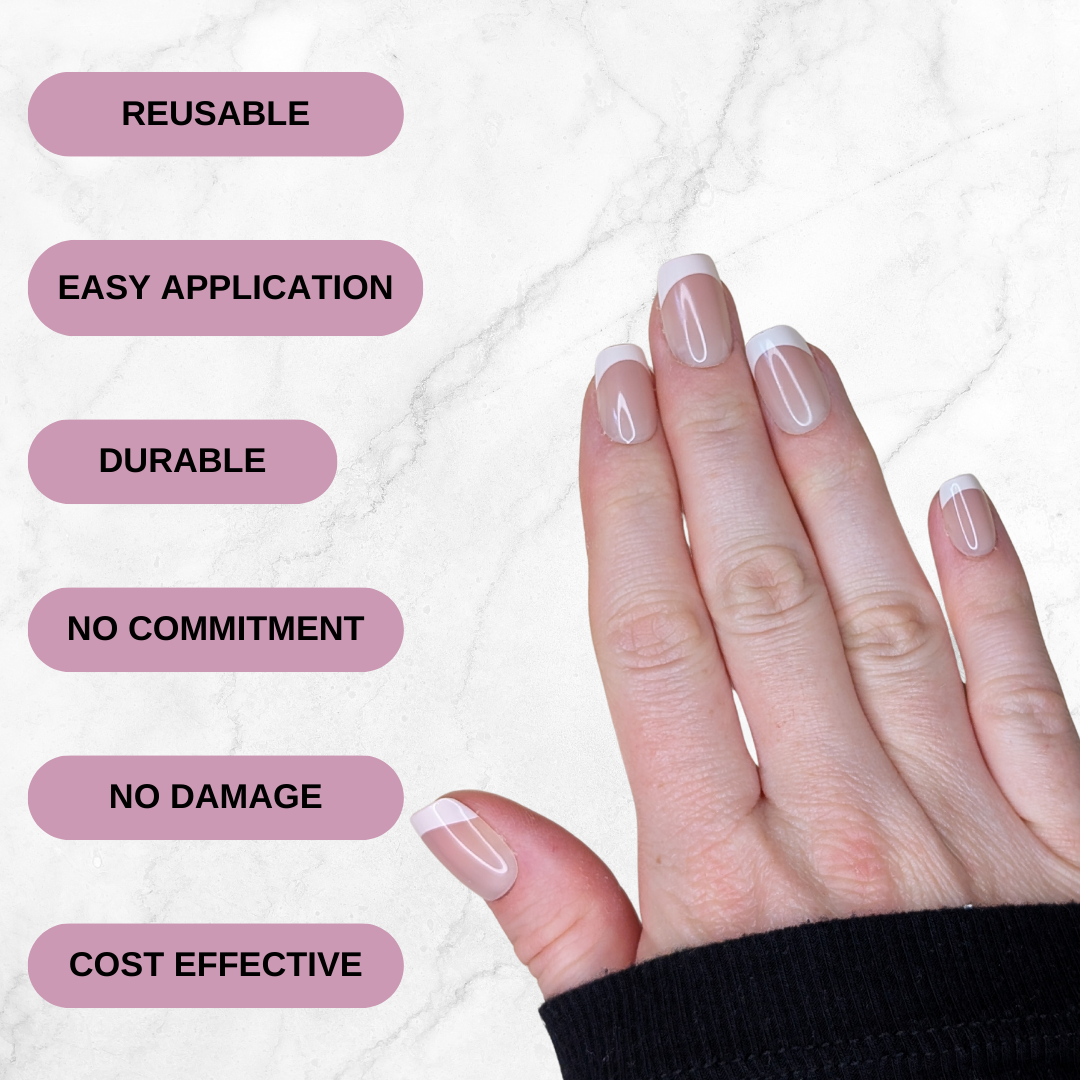 Right hand showing five square french tipped nails on a marble background. Reusable, easy application, durable, no commitment, no damage, cost effective.